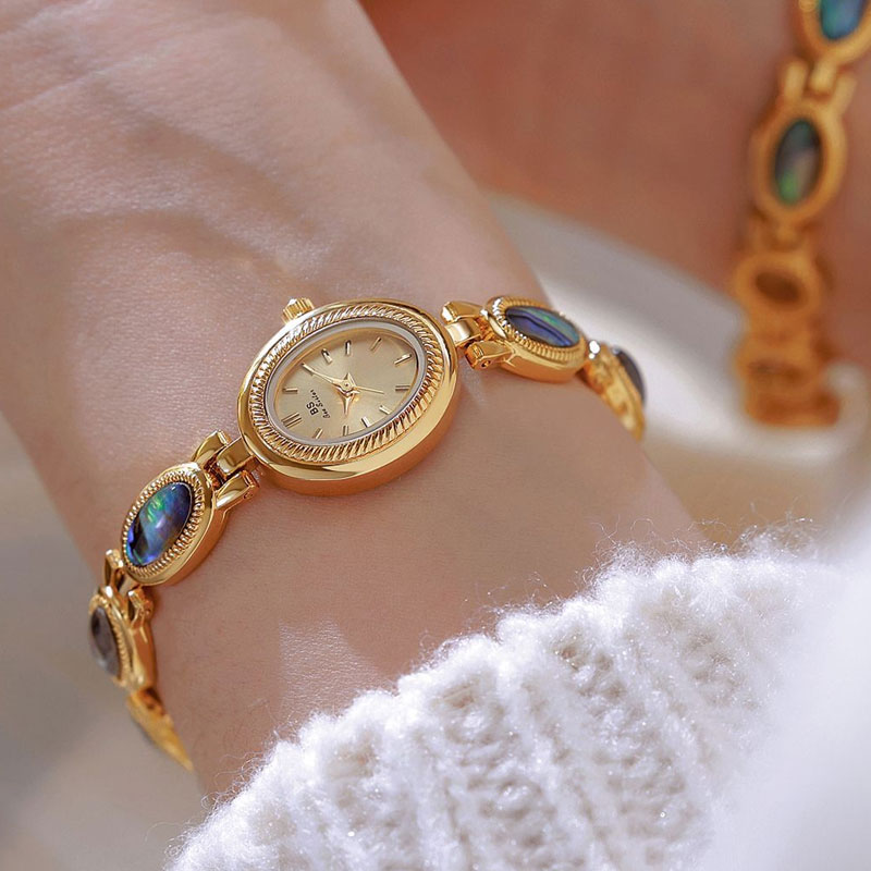 ساعة كلاسيكية طبيعية فاخرة من  - مراجعة Luxury Watch Gold And Black وسعره